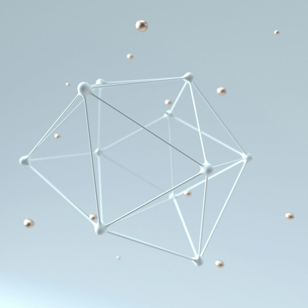 a white antenna with many small balls